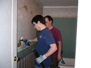 Paul and Tracy taking out the drywall